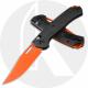 Benchmade Taggedout 15535OR-01 Knife - Orange Cerakote MagnaCut Clip Point - Carbon Fiber - Orange Anodized Backspacer - USA Mad